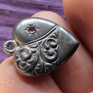 Antique sterling silver puffed heart charm